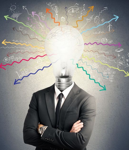 man in suit with light bulb for a head 