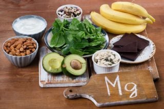 foods containing magnesium -- avocado, nuts, dark chocolate, bananas, leafy green vegetables