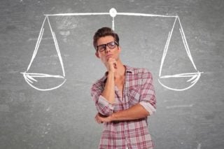 photo depicting man weighing options