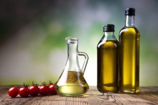 bottles of olive oil on a table