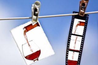 photo showing a photo and a strip of photo negatives of red wine being poured