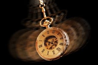 photo of swinging pocket watch
