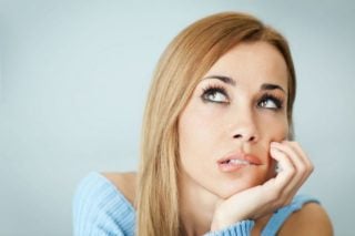woman looking doubtful