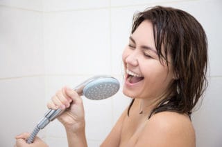 woman singing in the shower