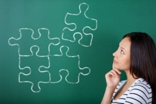 woman thinking how to solve a puzzle